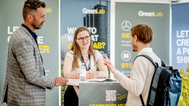 exhibition stand with people talking